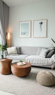 a living room filled with furniture and a large window