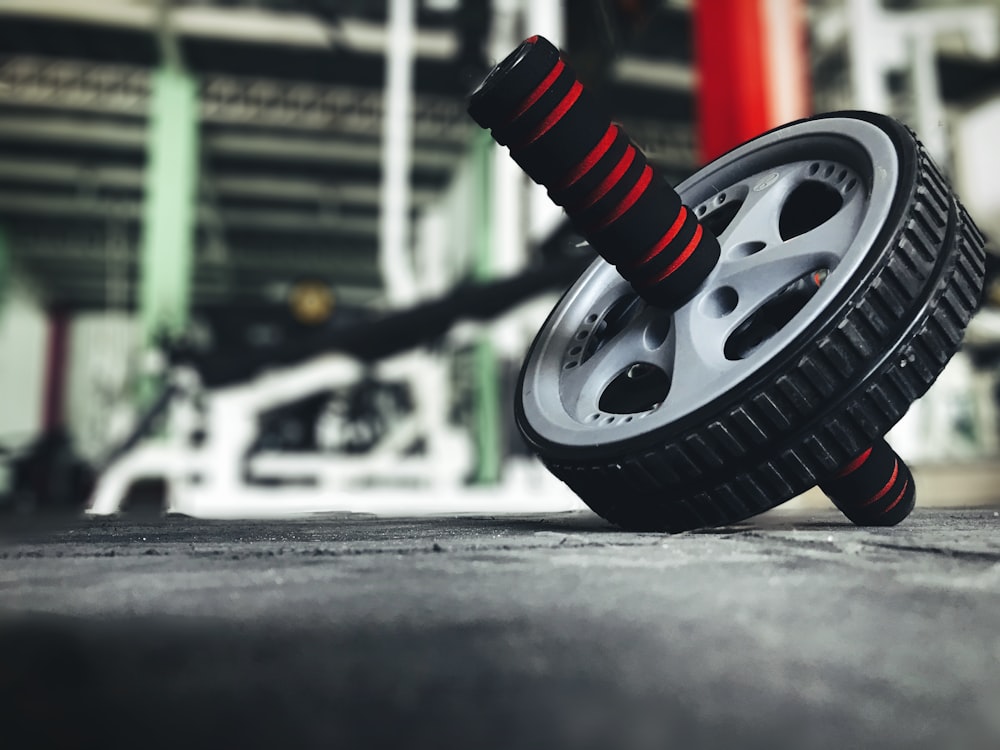 black and silver wheel on gray concrete floor