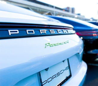 Side view of a Porsche Cayenne ready for airport transportation, polished and pristine.