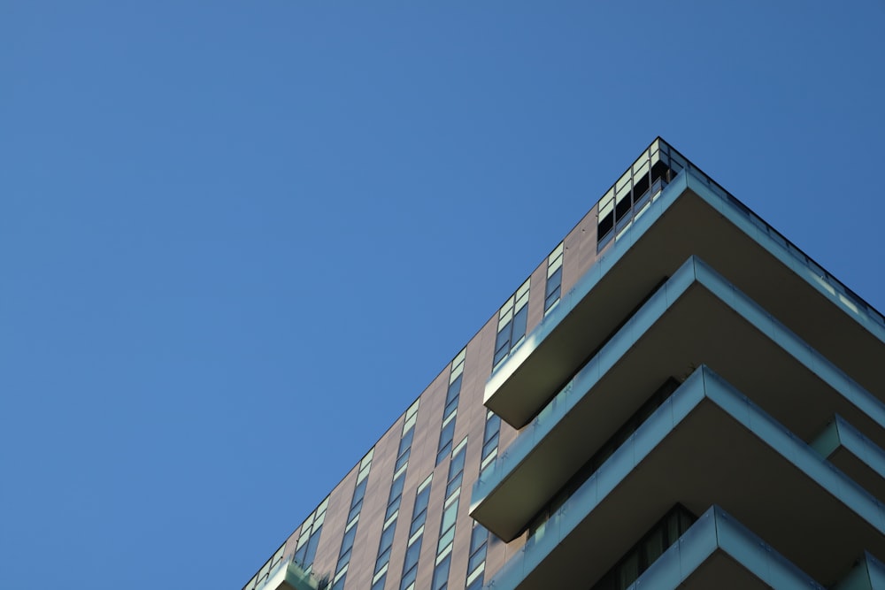 white and brown concrete building under blue sky during daytime