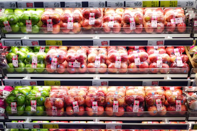 red and green apples in pack