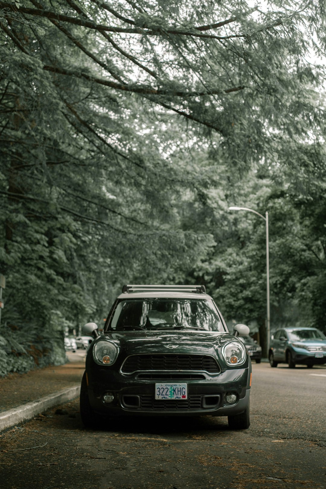 black mercedes benz g class on road