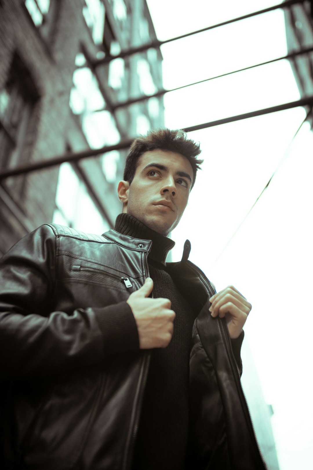man in black leather jacket