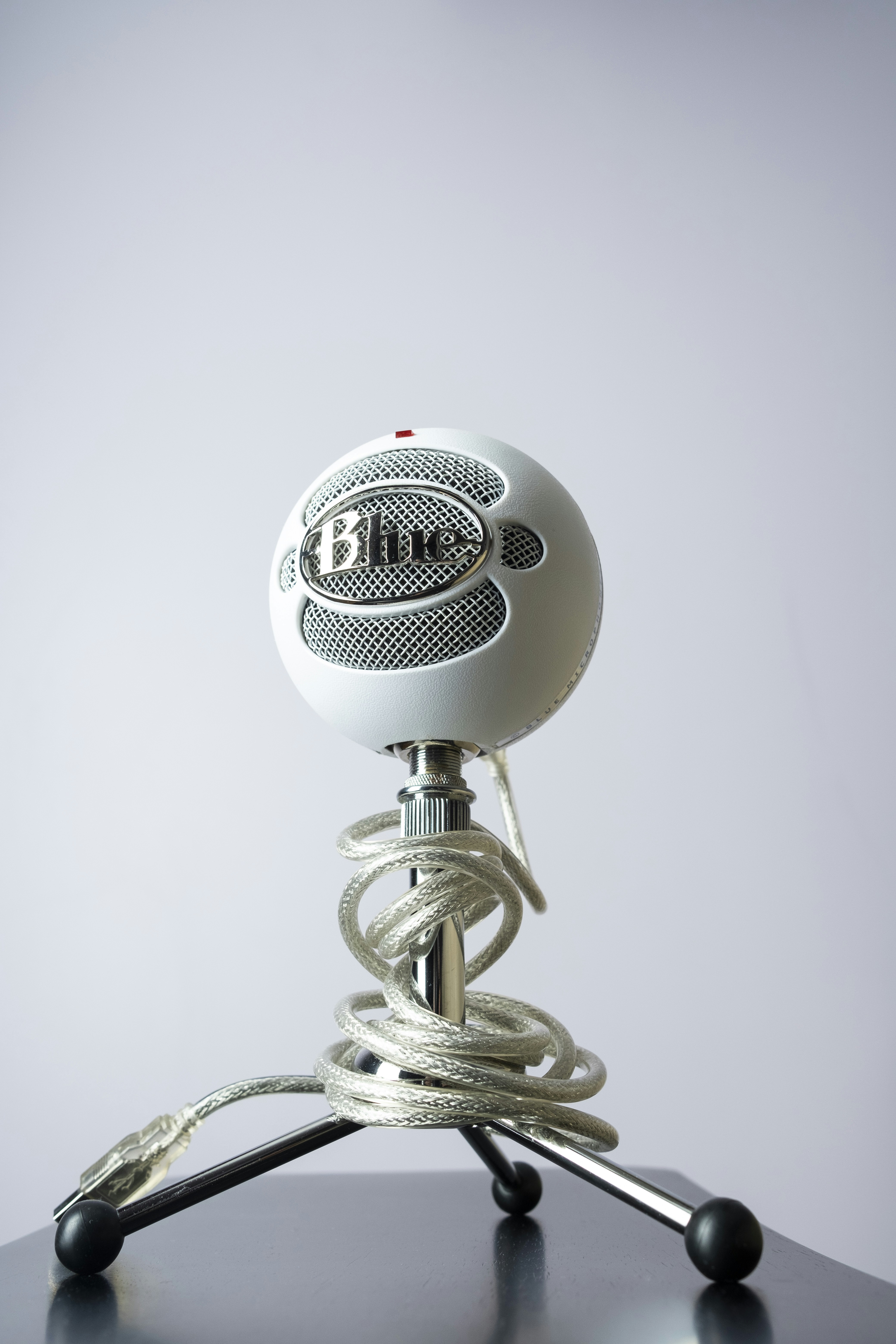 black and silver microphone on white table