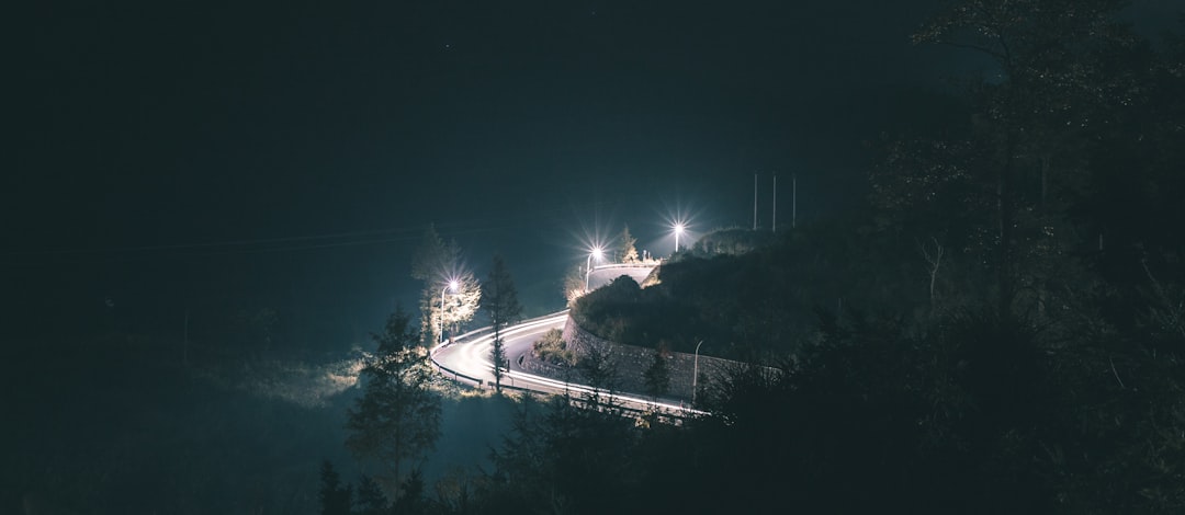 white light on road during night time