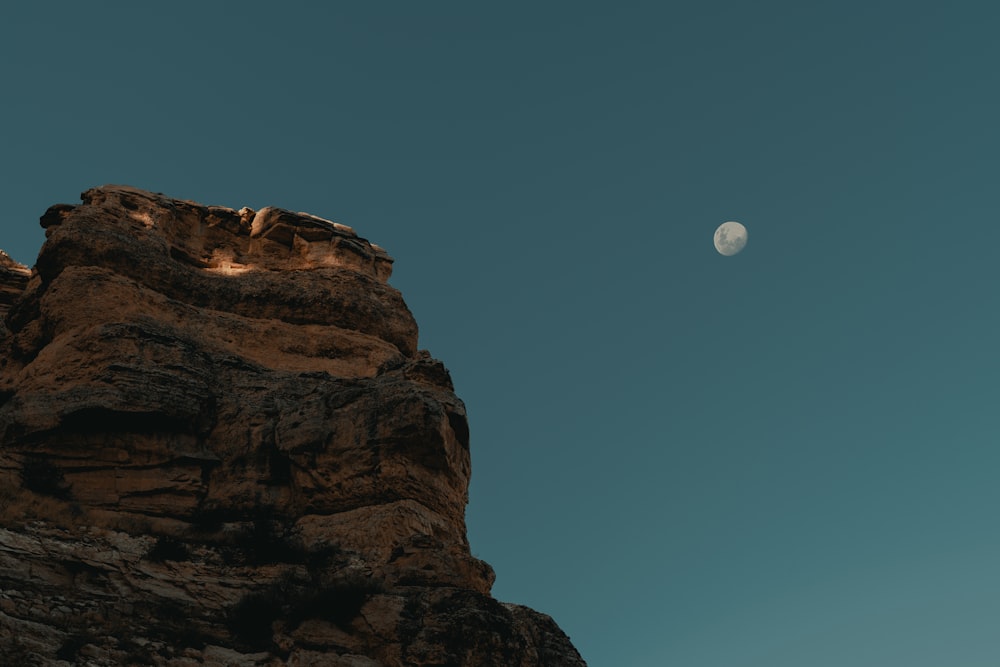 brown rock formation under blue sky during daytime