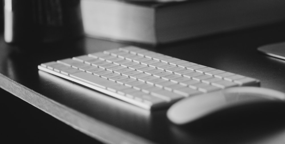 white and gray computer keyboard