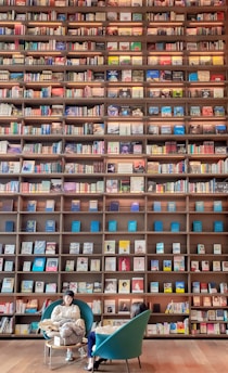 books on brown wooden shelves