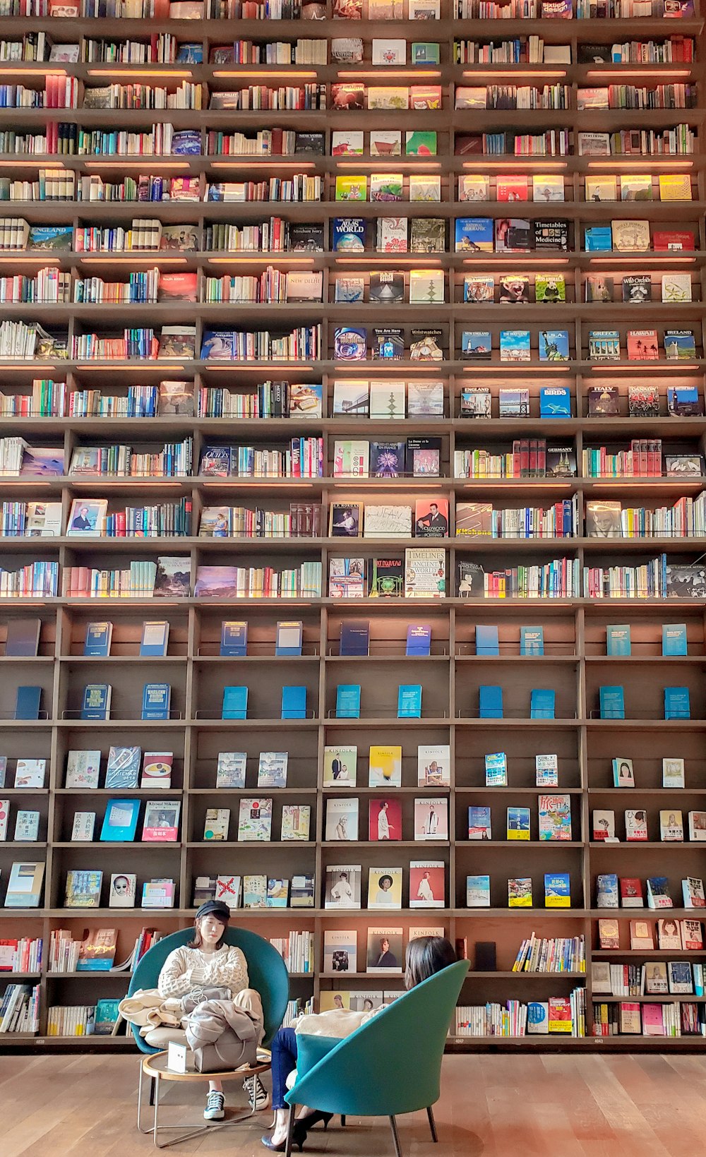 books on brown wooden shelves