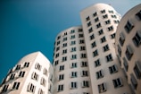 white concrete building under blue sky during daytime