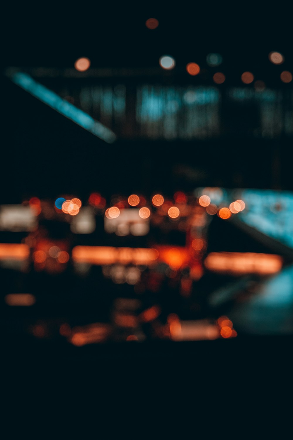 bokeh photography of bridge during night time