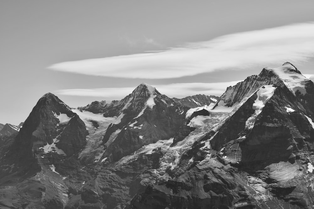 grayscale photo of snow covered mountain