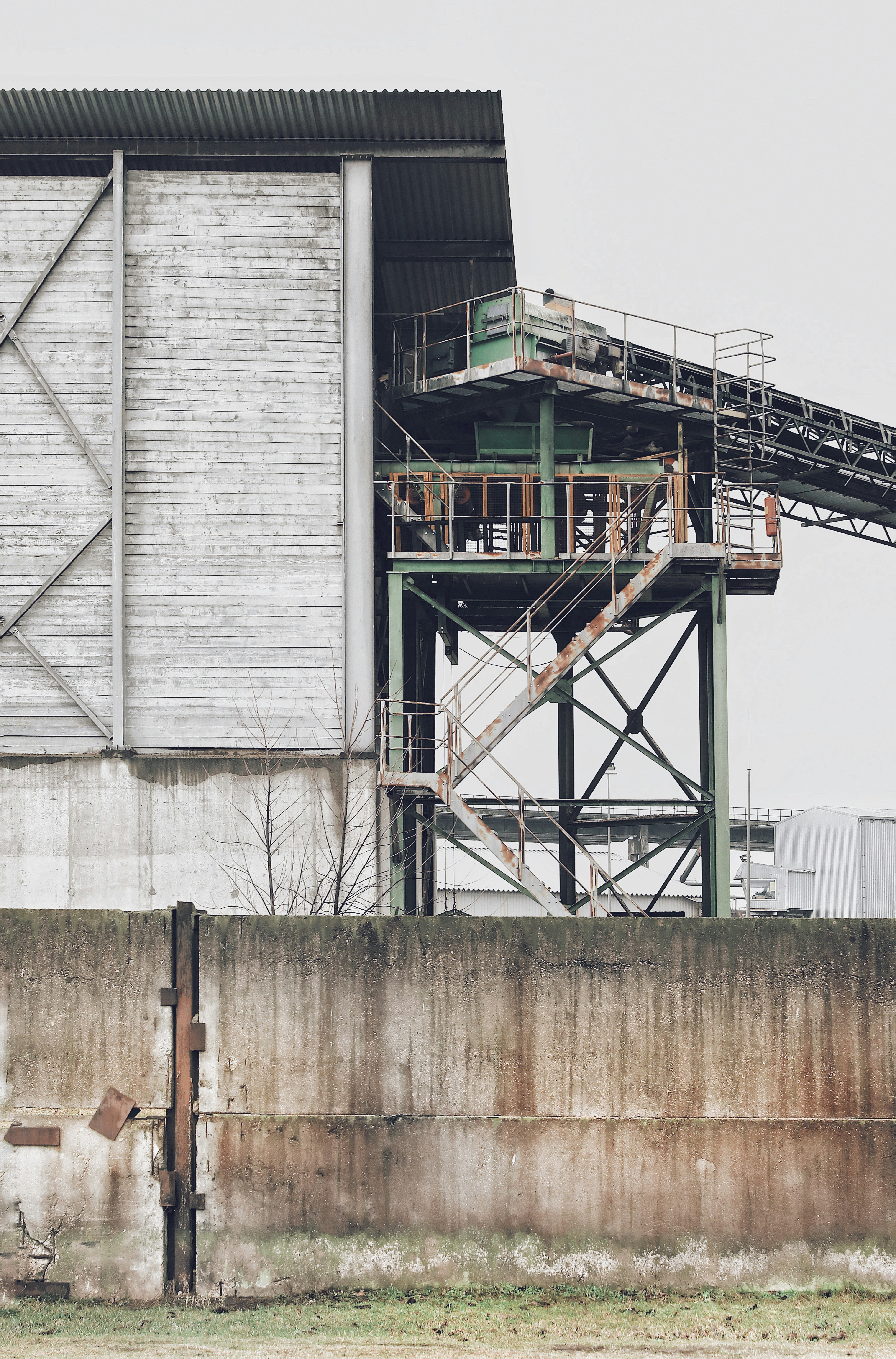 black metal ladder near white wall