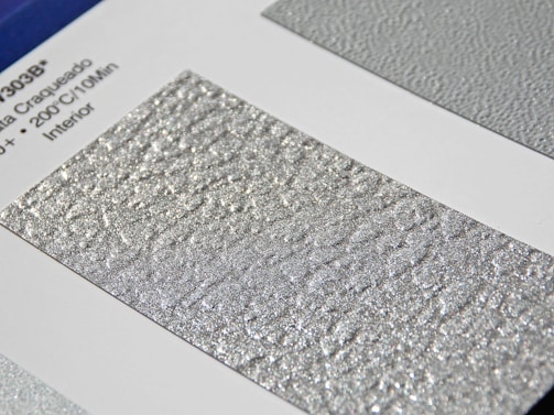 Niobium samples showing their smooth, silvery-gray finish, illuminated softly to reveal subtle details.