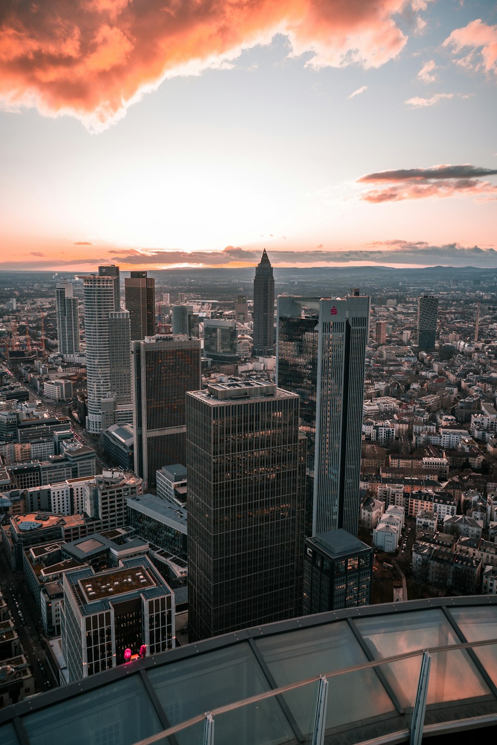 aerial view of city buildings during sunset