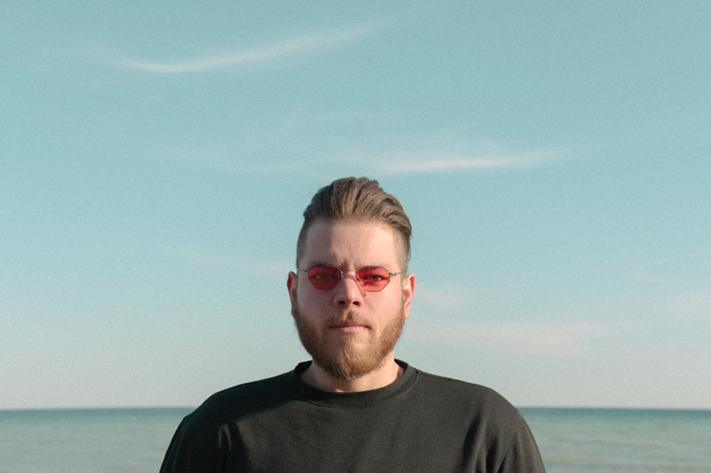 Smart casual gay man with glasses