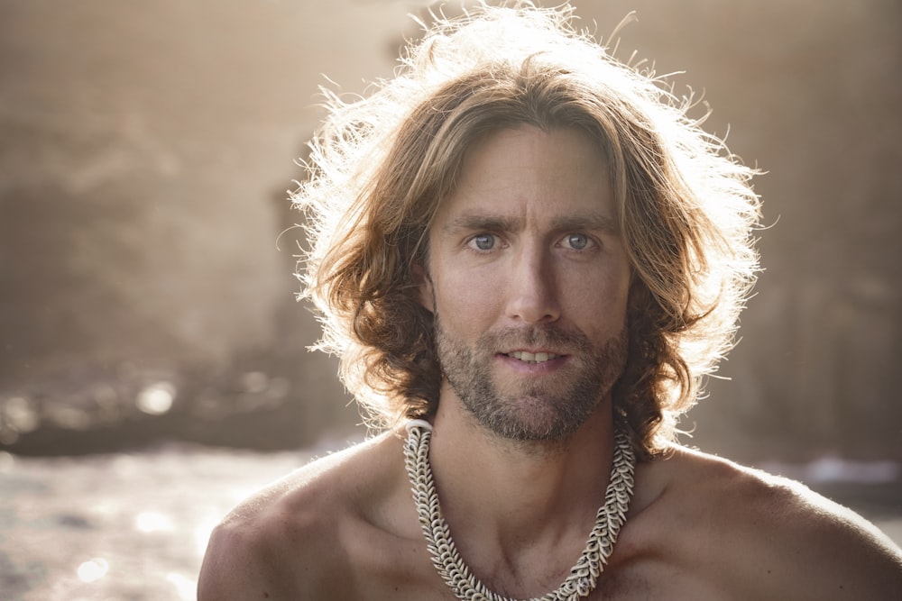 man with brown curly hair