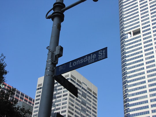 black and white street sign in Lonsdale Street Australia