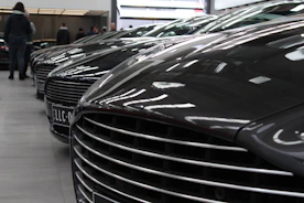 Display of various premium car batteries lined up in the store