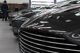 A row of roof motors neatly arranged on a display shelf with soft lighting.