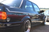 An outdoor view of a car showcasing its glossy finish.