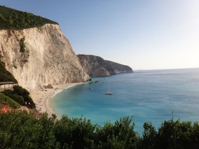 A boat below the white cliffs of the Lefkada west coast