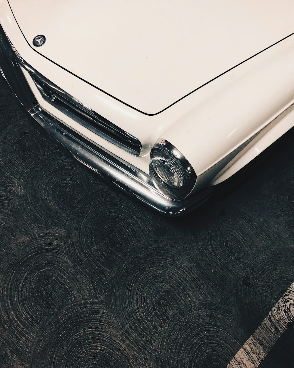 white car on black asphalt road