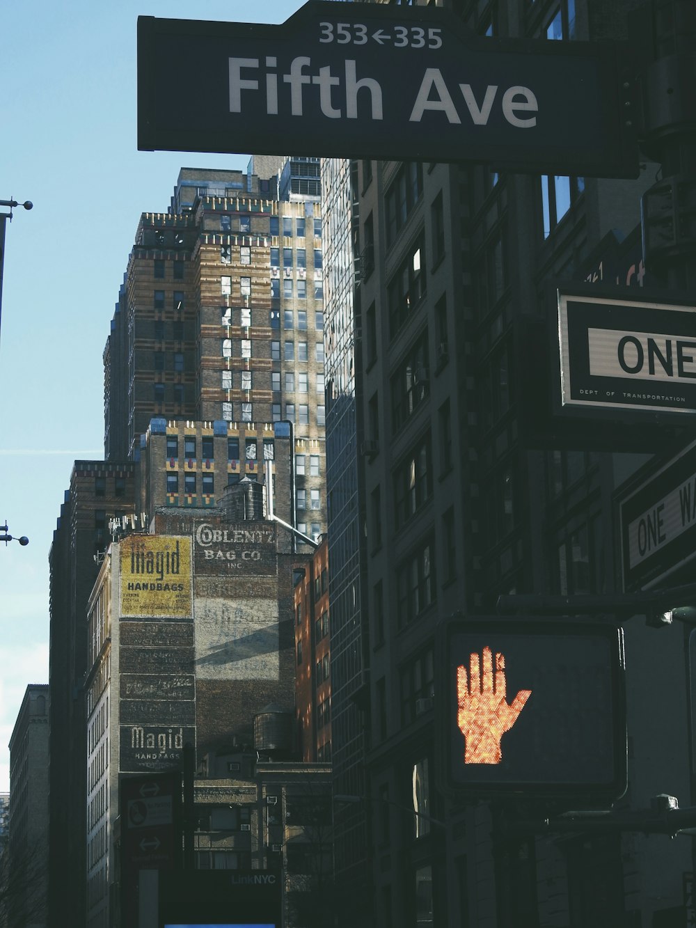 a city street with a lot of tall buildings