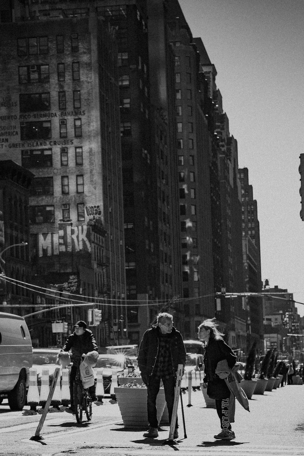 grayscale photo of people walking on street