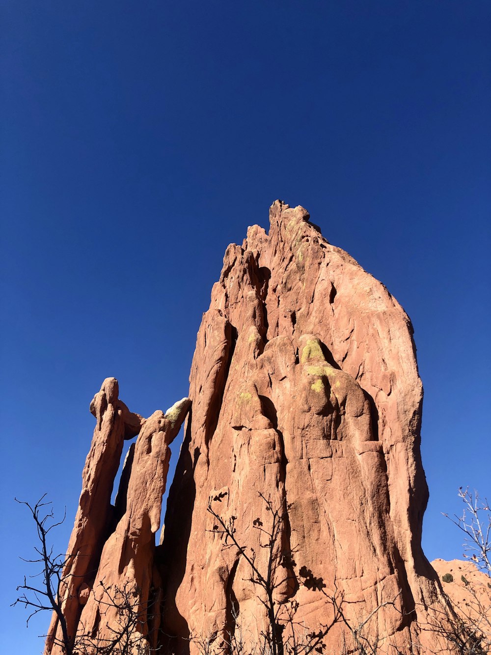 brown rock formation under blue sky during daytime