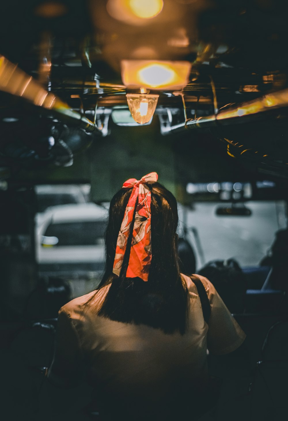 woman in black and red hijab