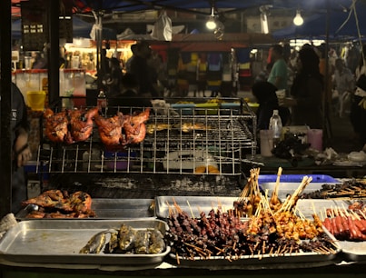 grilled meat on stainless steel tray
