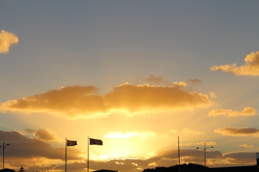 silhouette of flag during sunset