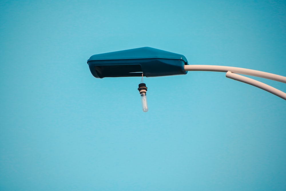 blue and silver umbrella under blue sky