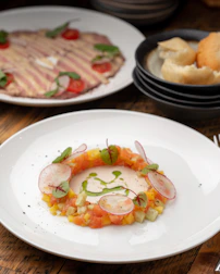 Close-up of a beautifully plated Scandinavian dish with fresh ingredients.