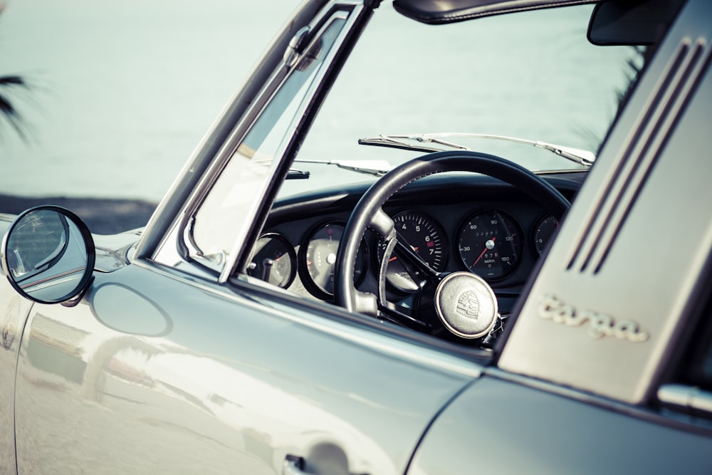 black and silver car steering wheel