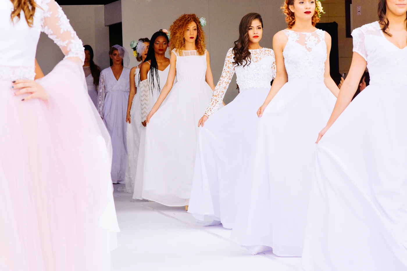 Bridal fashion week trends for fall weddings — Models walk the Bridal Fashion Week runway in dramatic fall-ready gowns.