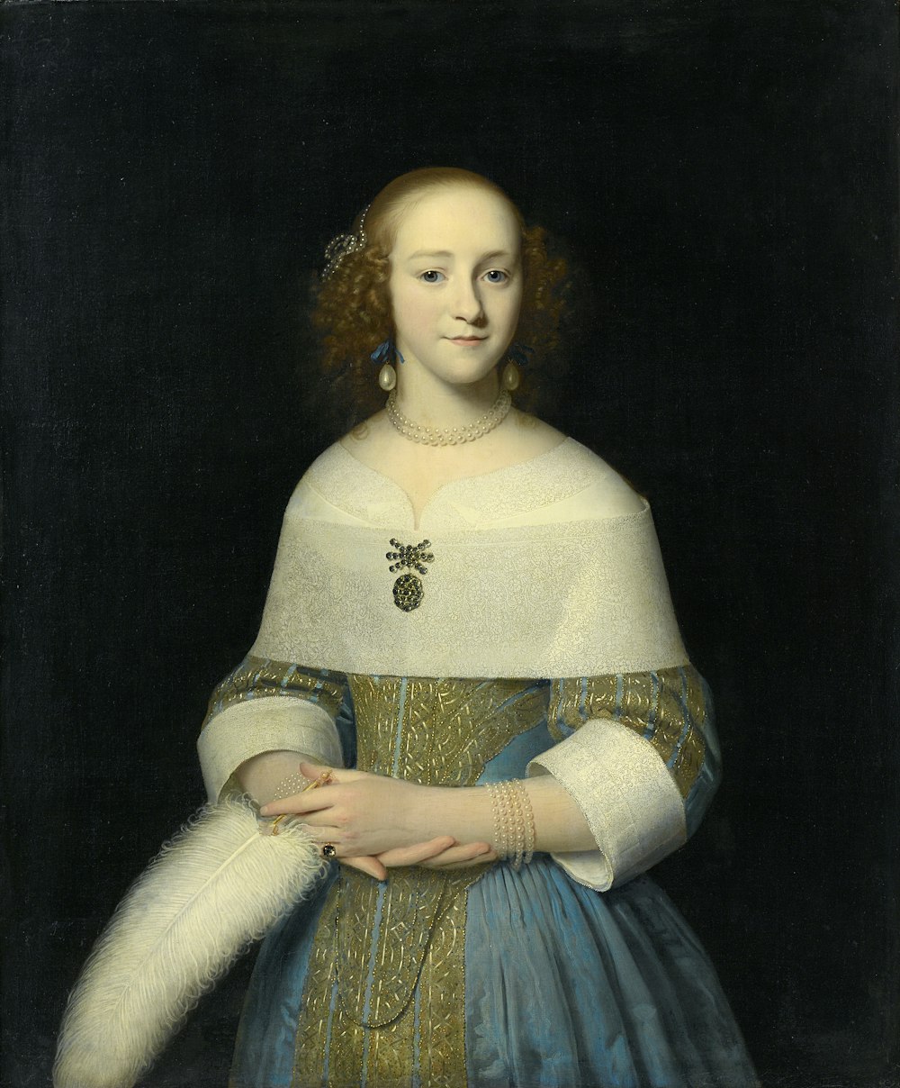 woman in white and blue dress