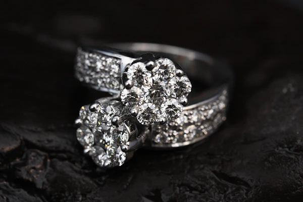 Silver cluster ring with floral settings and pavé band