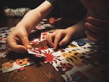 child playing with puzzle game
