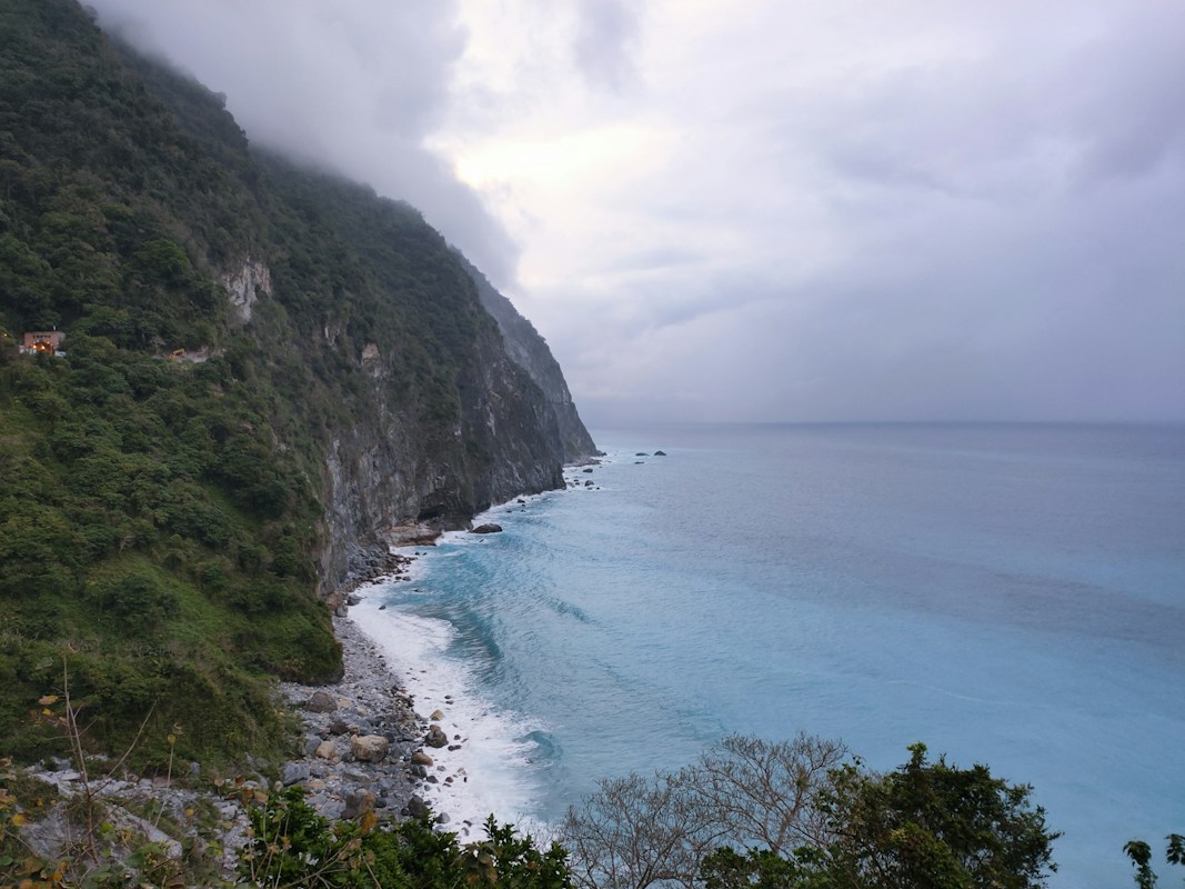 Green cliffs of the Qingshui Cliffs dropping into the Pacific Ocean