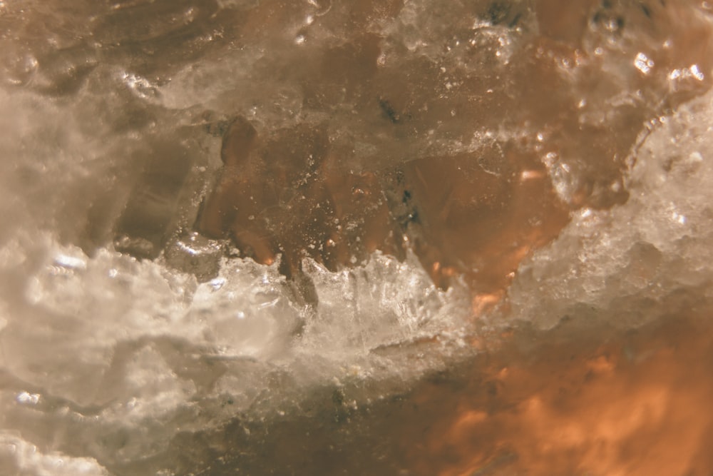 water splash on brown wooden surface