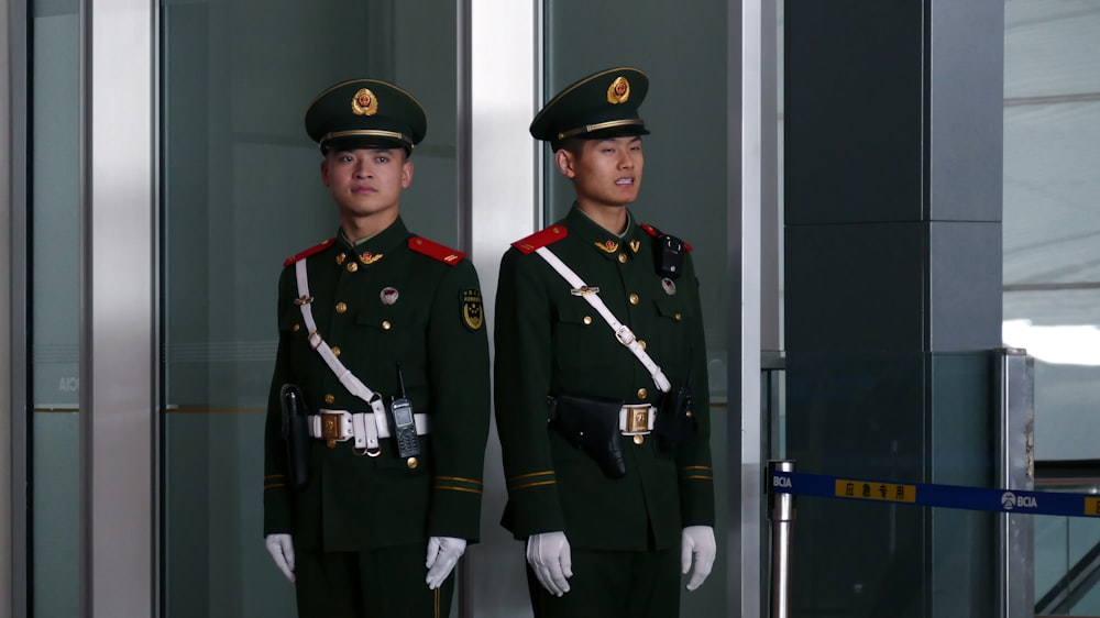 man in black and brown camouflage uniform