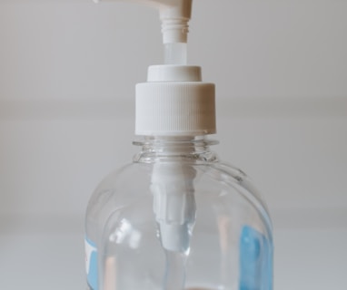 white and clear plastic pump bottle