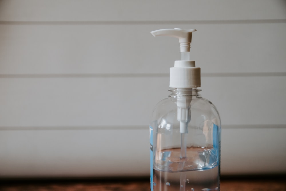 white and clear pump bottle