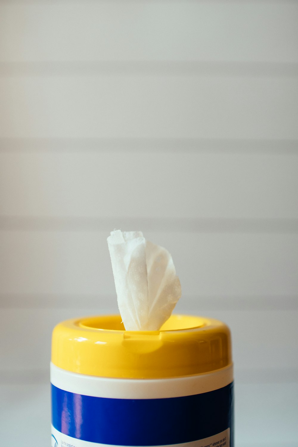 yellow and white plastic container
