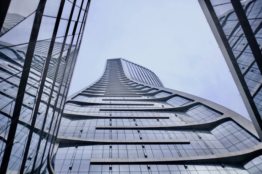 low angle photography of white high rise building