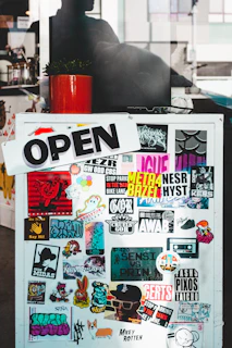 white and black UNK sticker