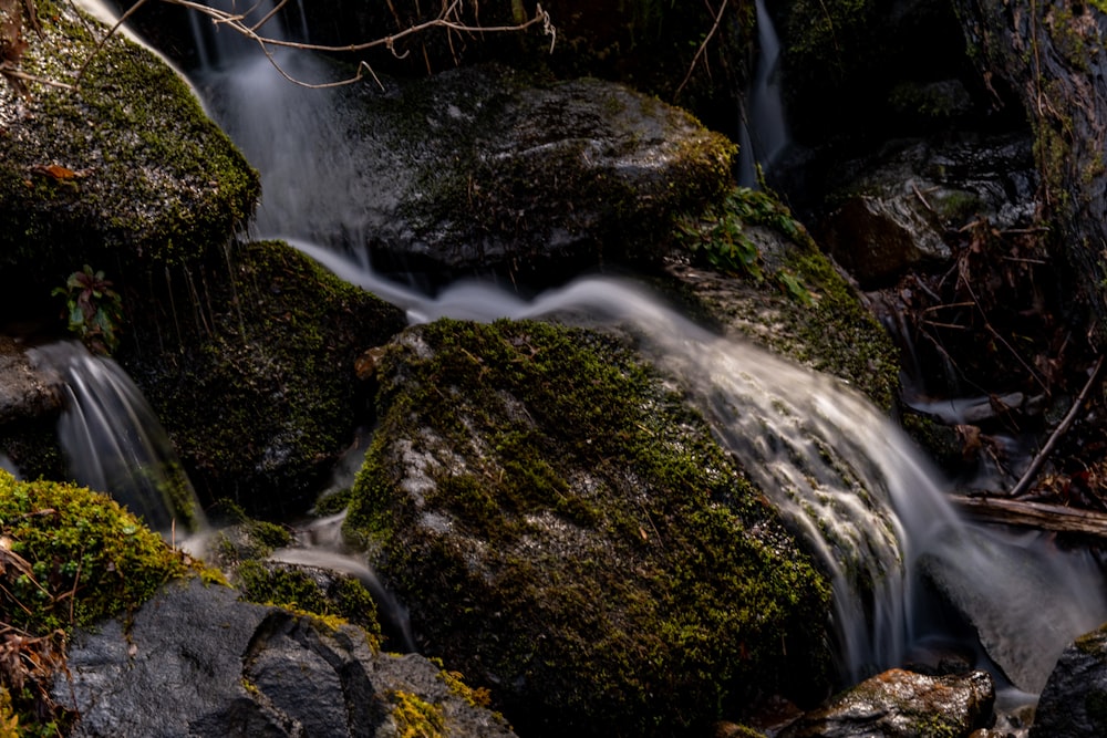 water falls on rocky mountain