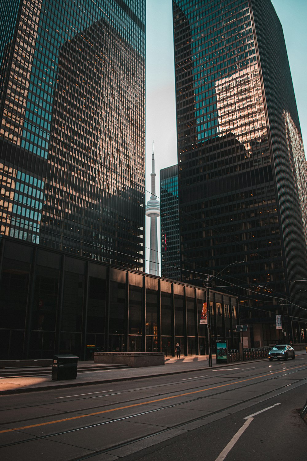 cars on road near high rise building during daytime